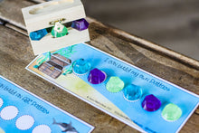 Load image into Gallery viewer, &quot;Build Your Own&quot; pattern card with aqua, purple and green gemstones.
