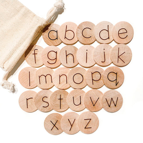 This Wooden Alphabet Disc Set included 26 discs with Uppercase Letters on one side and Lowercase Letters on the other.